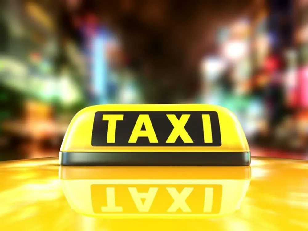 Taxi van de Arnhemse Taxi, onderweg voor een rit in Huissen